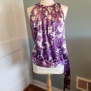 Gorgeous satiny purple blouse with floral watercolor-type pattern. Size large